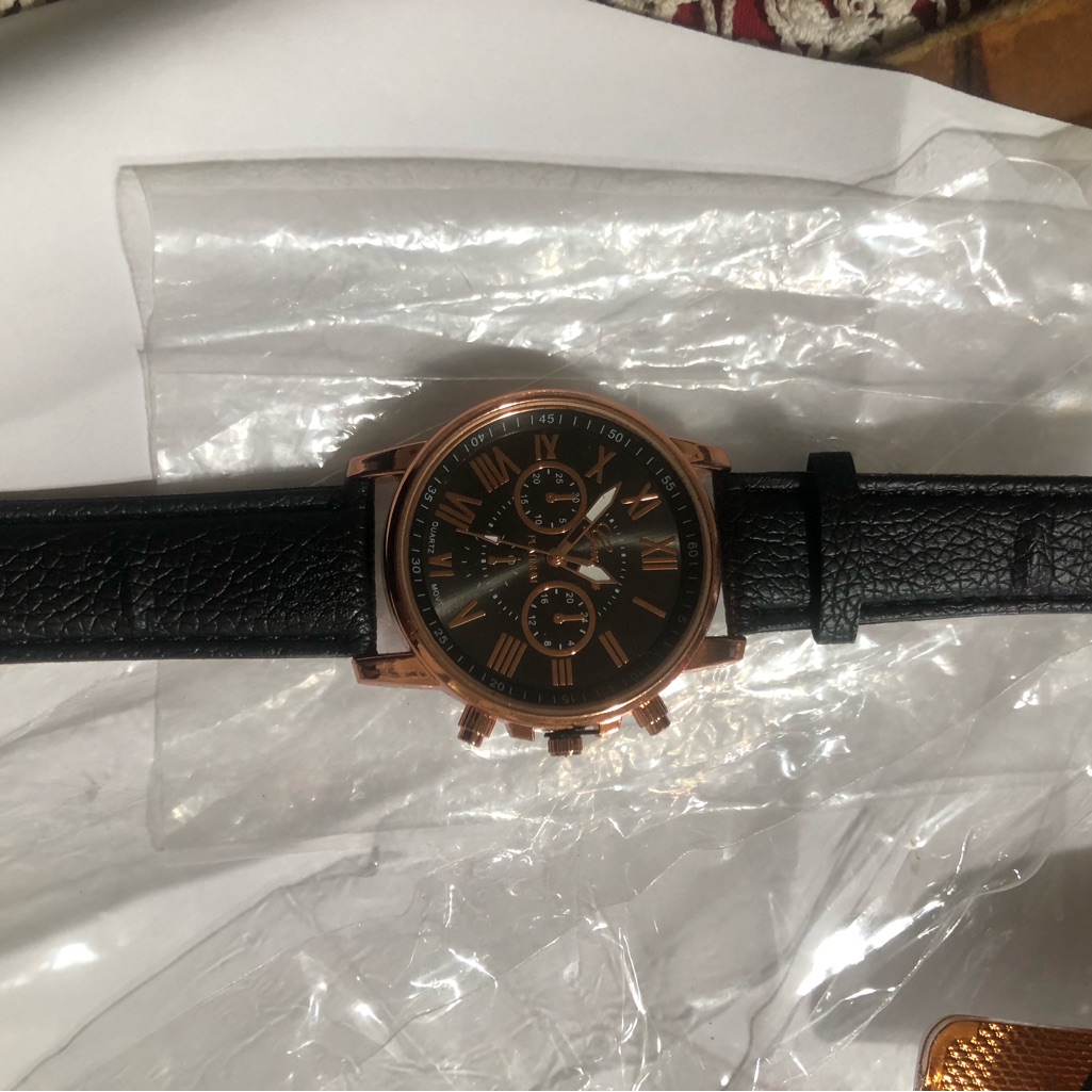Black And Rose Gold Watch
